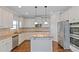Modern kitchen, granite countertops, and stainless steel appliances at 149 Elkins Blvd, Locust Grove, GA 30248