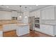 Modern kitchen with island and stainless steel appliances at 149 Elkins Blvd, Locust Grove, GA 30248