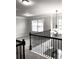 Spacious landing with chandelier and windows at 149 Elkins Blvd, Locust Grove, GA 30248