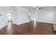 Bright living room with hardwood floors and access to kitchen at 149 Elkins Blvd, Locust Grove, GA 30248