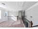 Bright loft area with carpeting and natural light at 149 Elkins Blvd, Locust Grove, GA 30248