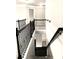 Elegant staircase with wrought iron railing at 149 Elkins Blvd, Locust Grove, GA 30248