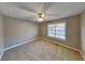 Spacious bedroom featuring a ceiling fan and large window at 4217 Pullman Ct, Austell, GA 30106