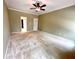 Large bedroom with neutral walls, carpeting, and ceiling fan at 3648 Clark Hill Way, Buford, GA 30519