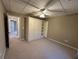 Basement bedroom with closet and built-ins at 3648 Clark Hill Way, Buford, GA 30519