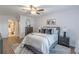 Main bedroom with ensuite bathroom and hardwood floors at 41 Doranne Se Ct, Smyrna, GA 30080
