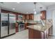 Modern kitchen with stainless steel appliances and granite counters at 41 Doranne Se Ct, Smyrna, GA 30080