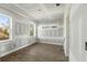 Unfinished bedroom with ample natural light from multiple windows, pre-paint at 120 N Gwinnett St, Buford, GA 30518