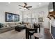 Living room with sectional sofa, fireplace, and access to balcony at 1577 Aldworth Se Pl, Atlanta, GA 30339