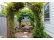 Charming garden path with arbor and bird feeders at 2193 Bliss Ln, Marietta, GA 30062