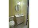 Bright bathroom with a marble countertop on the vanity and a decorative mirror at 22 Cardinal Ln, Jonesboro, GA 30238