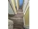 The hallway is long with hardwood floors, and white doors at 22 Cardinal Ln, Jonesboro, GA 30238