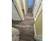 Hallway with gray wood floors and neutral paint at 22 Cardinal Ln, Jonesboro, GA 30238