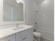 Clean bathroom with white fixtures and a shower/tub combo at 1072 Green St, Roswell, GA 30075