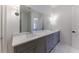 Bathroom with double vanity and marble floor at 1072 Green St, Roswell, GA 30075