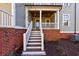 Townhome exterior showing steps leading to front porch at 1072 Green St, Roswell, GA 30075