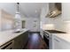 Kitchen with stainless steel appliances, island and eat-in bar area at 1072 Green St, Roswell, GA 30075