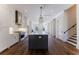 Modern kitchen with island and hardwood floors at 1072 Green St, Roswell, GA 30075