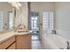 Bathroom features a large soaking tub and updated vanity at 3235 Roswell Rd # 709, Atlanta, GA 30305