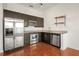 Modern kitchen features stainless steel appliances and hardwood floors at 333 Nelson Sw St # 404, Atlanta, GA 30313