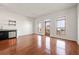 Hardwood floors, large windows, and access to balcony at 333 Nelson Sw St # 404, Atlanta, GA 30313