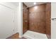 Large tiled shower with a modern design at 333 Nelson Sw St # 404, Atlanta, GA 30313