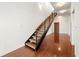 Modern open staircase with wood treads and metal railing at 333 Nelson Sw St # 404, Atlanta, GA 30313