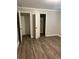 Bedroom with two closets and laminate flooring at 1228 Elizabeth Sw Ave, Atlanta, GA 30310