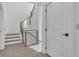 Modern staircase with light wood and metal railings at 2726 Thornwilde Se Ln, Vinings, GA 30339