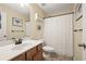 Bathroom with shower/tub combo and white decor at 439 Mountain View Ln, Woodstock, GA 30188