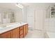 Double vanity bathroom with shower and separate tub at 439 Mountain View Ln, Woodstock, GA 30188