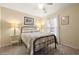 Cozy bedroom with a metal bed frame at 439 Mountain View Ln, Woodstock, GA 30188