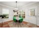 Charming breakfast nook with green retro table and chairs at 439 Mountain View Ln, Woodstock, GA 30188