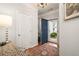 Entryway with coat closet and view to the backyard at 439 Mountain View Ln, Woodstock, GA 30188