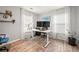 Home office with a standing desk and two monitors at 439 Mountain View Ln, Woodstock, GA 30188