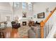 Spacious living room with high ceilings, fireplace, and hardwood floors at 439 Mountain View Ln, Woodstock, GA 30188