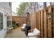 Private patio with seating and a heater at 439 Mountain View Ln, Woodstock, GA 30188