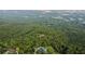 Aerial view of property showcasing extensive wooded area at 101 Barker Rd, Cumming, GA 30040