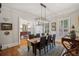 Elegant dining room featuring a large table and hardwood floors at 101 Barker Rd, Cumming, GA 30040