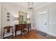 Bright entryway with hardwood floors and elegant console table at 101 Barker Rd, Cumming, GA 30040