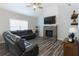 Spacious living room with stone fireplace and vaulted ceiling at 25 Water Oak Trl, Covington, GA 30014