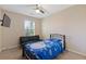 Bedroom with twin bed, black couch, and TV at 1246 Adcox Sq, Stone Mountain, GA 30088