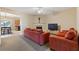 Living room with fireplace, neutral decor, and open floor plan at 1246 Adcox Sq, Stone Mountain, GA 30088