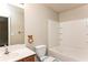 Clean bathroom with shower/tub combo and wood vanity at 2852 Vining Ridge Ter, Decatur, GA 30034