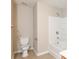 Clean bathroom featuring a toilet, bathtub, and shower at 2852 Vining Ridge Ter, Decatur, GA 30034