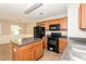Kitchen with black appliances and an island at 2852 Vining Ridge Ter, Decatur, GA 30034
