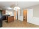 Kitchen with an island, dark countertops, and wood cabinets at 2852 Vining Ridge Ter, Decatur, GA 30034