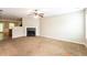 Living room features a fireplace and access to the kitchen at 2852 Vining Ridge Ter, Decatur, GA 30034