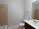 Bathroom featuring a tub and single vanity sink with tiled floors at 342 Holbrook Rd, Smyrna, GA 30082