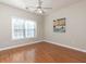 Bright bedroom with hardwood floors and ceiling fan at 342 Holbrook Rd, Smyrna, GA 30082